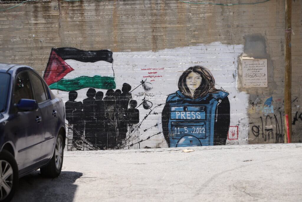 A mural of slain Palestinian journalist Shireen Abu Akleh painted on a wall inside the camp. (Malik Hamamra/Mondoweiss) Aida Refugee Camp, occupied West Bank, May 2023.